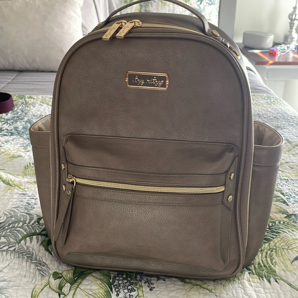 Itzy Mini… perfect condition! Carried once!